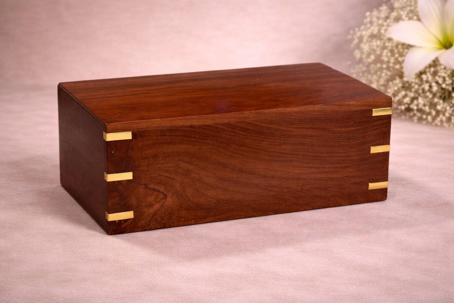 Premium wooden pet urn with elegant brass corner accents