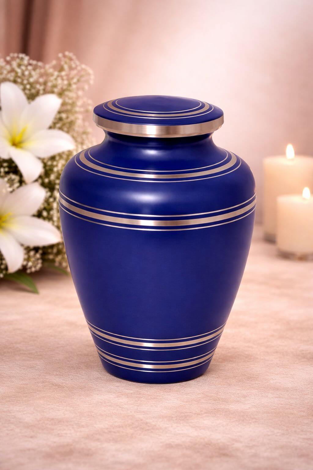 Elegant royal blue brass adult urn with gold band accents