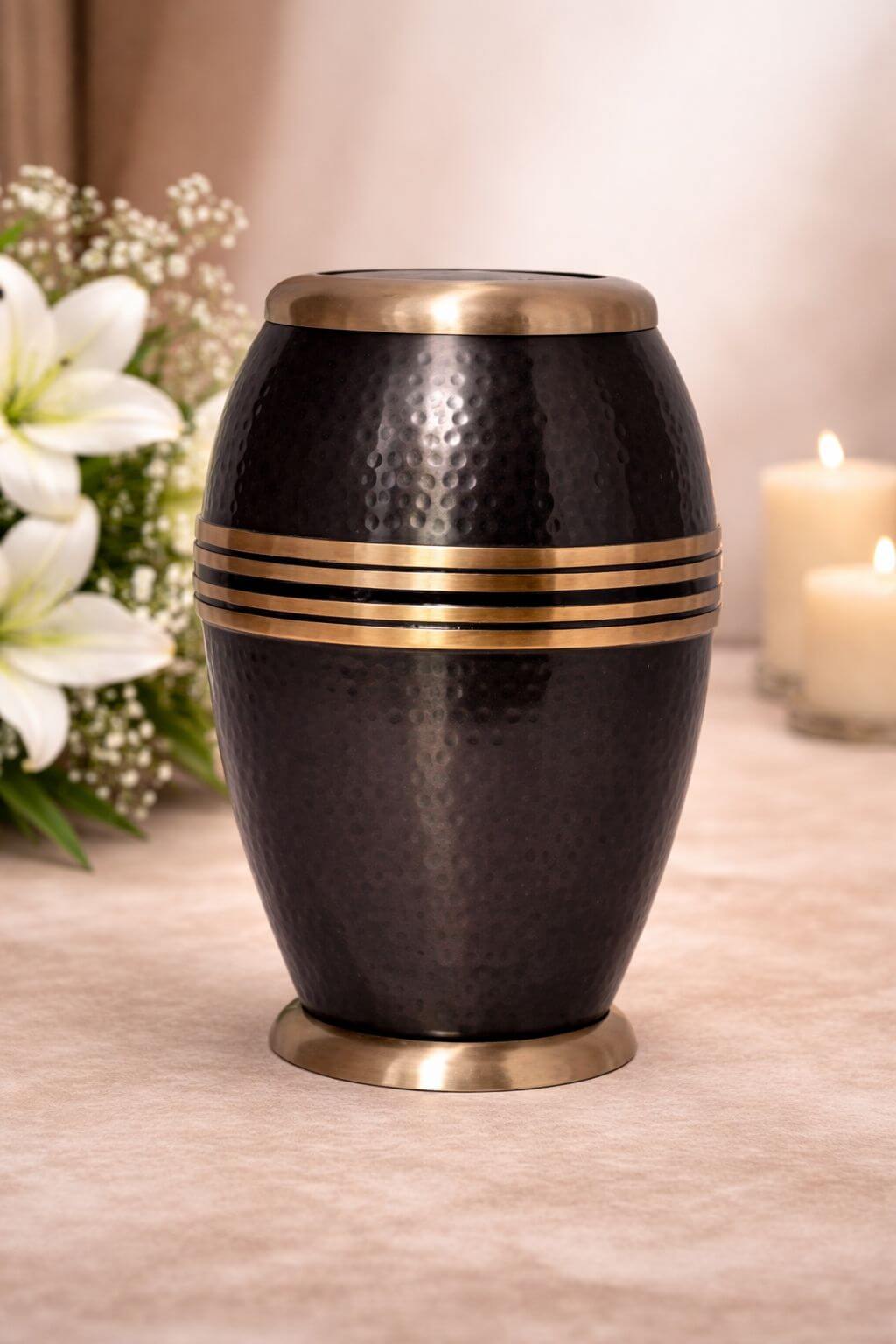 Elegant black hammered brass adult urn with gold band accents